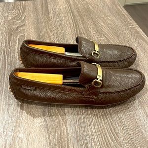 Cole Haan slip on driving loafers .